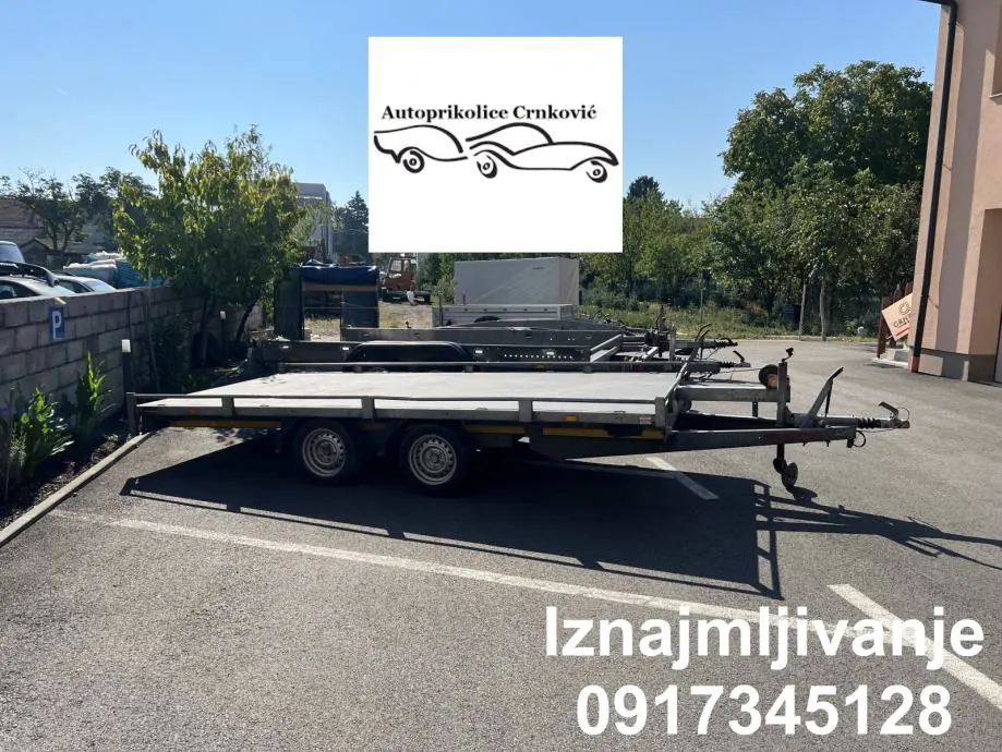Dvije manje prikolice, otvorena i s ceradom